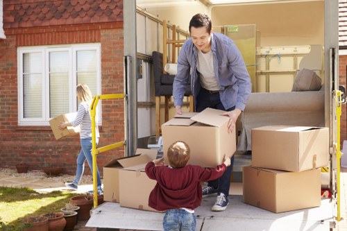 Professional movers from Poppy Movers handling belongings