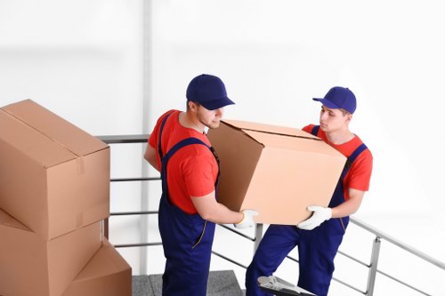 Professional movers assisting with the packing process