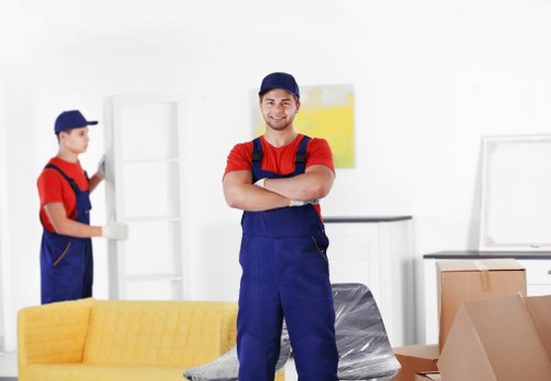 Professional movers handling furniture for Poppy Movers