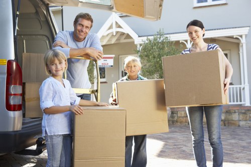 Professional movers handling household items