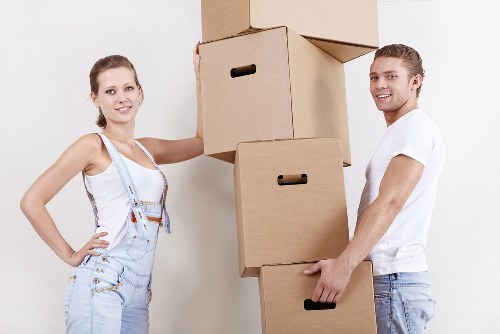 Professional movers transporting furniture